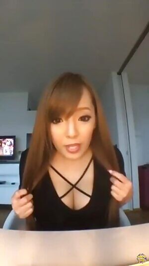 Showing how heavy her tits can be