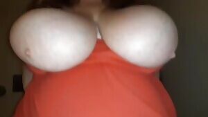 Riding my cock slow with her gigantic tits out