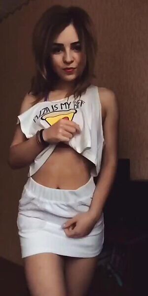 Pulling down her skirt