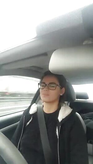 Beautiful Girl Playing With Her Tits While Driving
