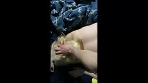 Holding her hair while pounding