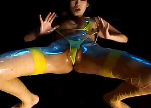 Oiled And Grinding Her Thong Into Her Pussy