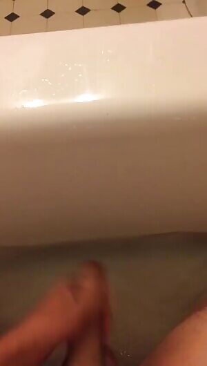 Asian guy taking a bath