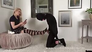 Slave made to cum on her feet & lick them clean