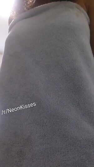 Dropping my towel to show of some piercings