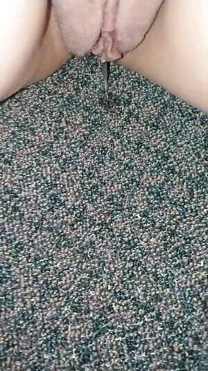 close up of me pissing on the carpet at the office when nobody was around!