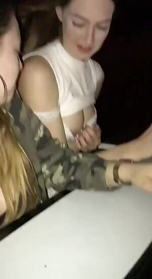 Happy girls on the roof of the car. Big and small tits. Lesbian? Real