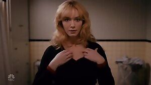 Christina Hendricks adjusting her perfect tits
