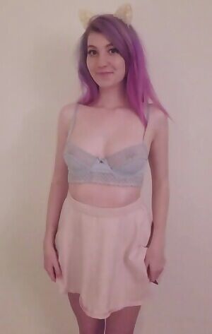 Shy girl in pastel tones