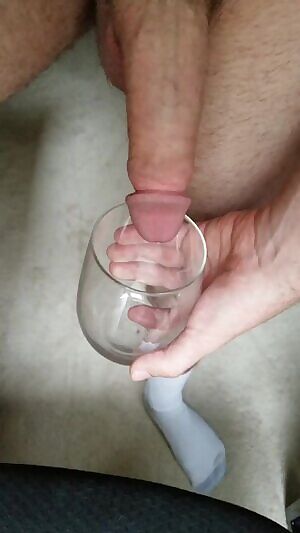 Peeing with morning into a glass