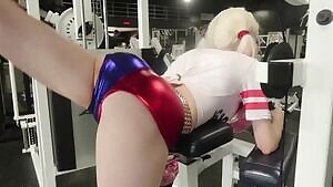 Amouranth working out at the gym as Harley Quinn