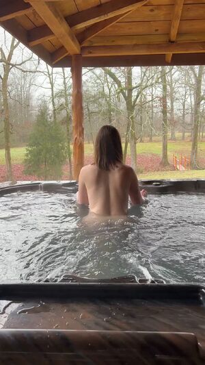 Slipping into the hot tub makes me crave your cock