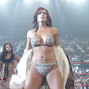 Victoria showing us what's underneath that trench coat