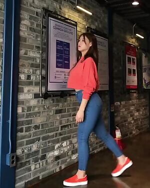 She's really putting those jeans to the test