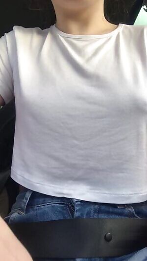 Risky titty drop whilst on a drive