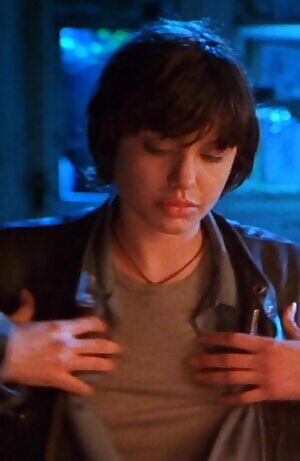 A 21 year old Angelina Jolie revealing her amazing breasts