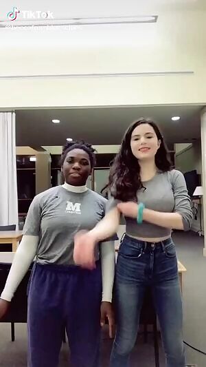 Slim and stacked college girl dancing