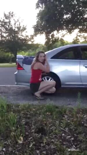 Dressing up hiding behind the car