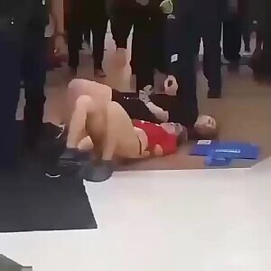 Two drug traffickers arrested at the airport. One loses her pants struggling to escape
