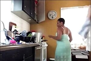 He walks up and starts fucking her in the kitchen while she's cooking
