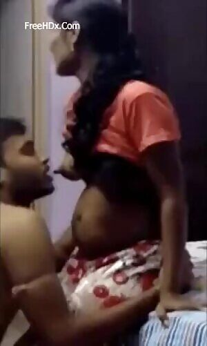 Desi lover sucking boobs after fuck