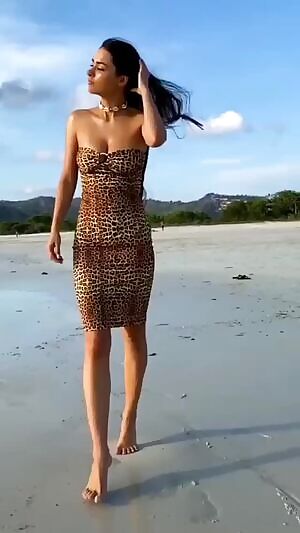 Helga bouncing on the beach