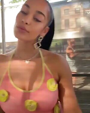 Jorja Smith should pull that shirt down instead of up and give us what we really want to see.