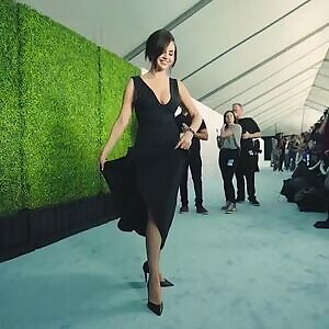 Selena Gomez teasing the photographers with a twirl. Later on she had at least one of them in her dressing room up her skirt eating her out.