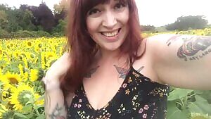 Showing off my tits in a field of sunflowers 🌻