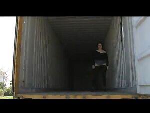 Girl in Empty Container Lorry
