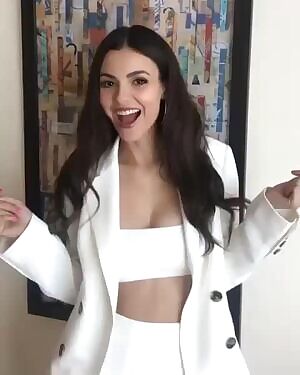 Victoria Justice opening her mouth