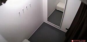 Pregnant girl in changing room