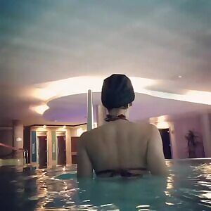 Yanet García coming out a pool