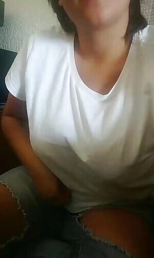 Flashing her boobs at work