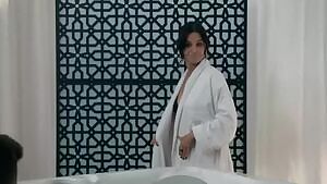 Courtney Cox in a Bikini on Modern Family