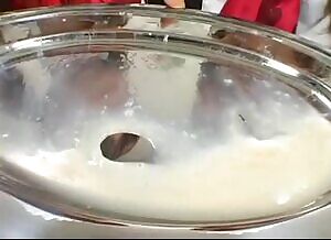 2 maids drink down a huge platter of cum.