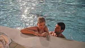 Scarlett Johansson getting out of a pool in Scoop