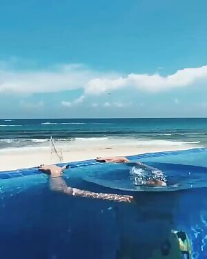 Jordyn Jones coming out of the water.