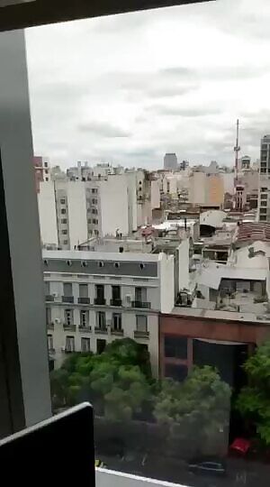 On a rooftop in full view