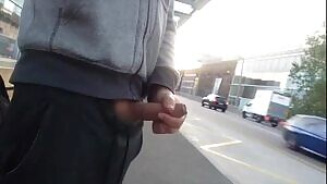 Uncut guy cumming by busy road