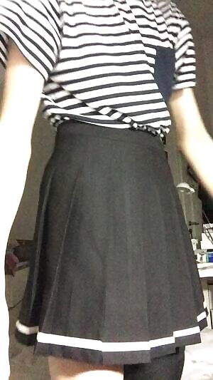 Showing off my skirt and a little of my face