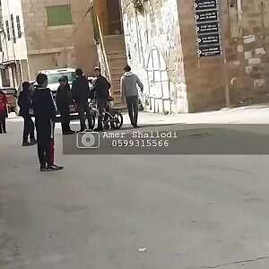 Israeli settler child threatens Palestinian child with a gun by pointing it to his face, allowed to go off scott free by the IDF