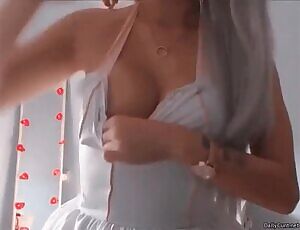 Teasing with her boobies
