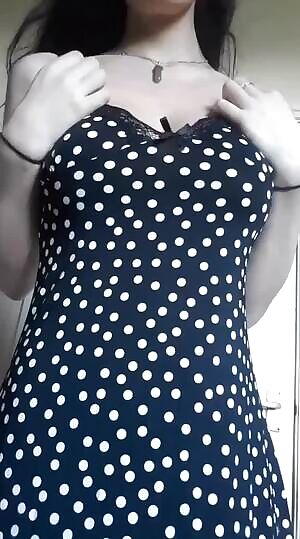 Peeling off her dress