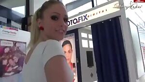 Lucy Cat fucks and leaves creampie in a public photo booth