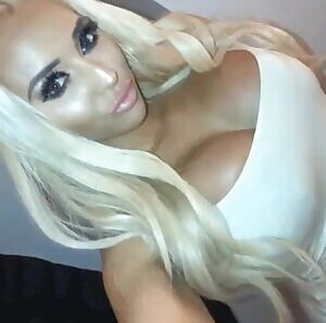 Young blonde flaunts her fake tits @_missmaisie