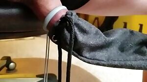 reveal by pulling a sack off the intact phallus