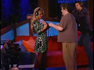 Retired porn star Sophia Rossi gets motorboated during an appearance on Howard Stern