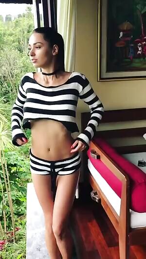 Seductive pose, with a slice of awesome view