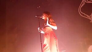 Tove Lo pulling her tits out during a concert